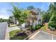 View of the side of the home with a charming balcony area over the garage at 774 Belrose Dr, Smyrna, GA 30080