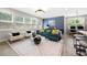 Bright living area featuring modern decor, large windows, and a dining area in the background at 774 Belrose Dr, Smyrna, GA 30080