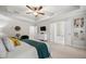 Well-appointed main bedroom featuring a tray ceiling, carpeted floors, and an ensuite bathroom at 774 Belrose Dr, Smyrna, GA 30080