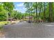 Expansive area in the backyard, perfect for outdoor activities and enjoying the natural surroundings at 1572 Azalea Dr, Lawrenceville, GA 30043