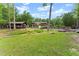 Expansive lawn in the backyard, perfect for outdoor activities and enjoying the natural surroundings at 1572 Azalea Dr, Lawrenceville, GA 30043