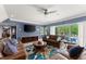 Basement featuring multiple seating areas, access to the pool, and TV area at 1572 Azalea Dr, Lawrenceville, GA 30043