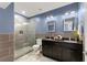 Bathroom with double vanity, tiled shower, and modern fixtures at 1572 Azalea Dr, Lawrenceville, GA 30043
