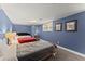 Bedroom with multiple beds and large windows providing ample natural light at 1572 Azalea Dr, Lawrenceville, GA 30043