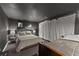 Bedroom featuring two beds with neutral décor and ambient lighting at 1572 Azalea Dr, Lawrenceville, GA 30043
