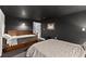Bedroom with two beds, dark paint, and closet for storage at 1572 Azalea Dr, Lawrenceville, GA 30043