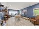 Bonus room with wood-look flooring, a fishing theme, and space for entertaining at 1572 Azalea Dr, Lawrenceville, GA 30043