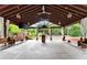 Interior view of chapel and altar, complete with bench seating, lighting and curtains at 1572 Azalea Dr, Lawrenceville, GA 30043