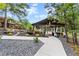 Backyard venue featuring manicured landscaping and elegant chapel with outdoor seating, perfect for special events at 1572 Azalea Dr, Lawrenceville, GA 30043