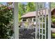 Lovely gazebo with inviting seating, surrounded by lush greenery and manicured landscaping at 1572 Azalea Dr, Lawrenceville, GA 30043