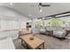 Spacious open-plan living room featuring high ceilings and comfortable seating arrangement at 1572 Azalea Dr, Lawrenceville, GA 30043