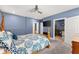 Comfortable main bedroom featuring a four-poster bed and ensuite bathroom at 1572 Azalea Dr, Lawrenceville, GA 30043