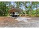 RV parking is availalbe in the wooded area of the property at 1572 Azalea Dr, Lawrenceville, GA 30043