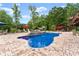 Inviting outdoor space with a sparkling pool, spa, and cabana offers the perfect spot for relaxation at 1572 Azalea Dr, Lawrenceville, GA 30043