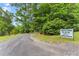 Roadside view of the sign directing to Amazing Place property at 1572 Azalea Dr, Lawrenceville, GA 30043
