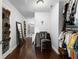 Long walk-in closet with built-in storage on either side for shoes and clothes at 1572 Azalea Dr, Lawrenceville, GA 30043