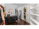 Spacious walk-in closet with dark wood floors and plenty of storage space at 1572 Azalea Dr, Lawrenceville, GA 30043