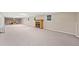 Finished basement with carpet flooring, fireplace, and recreational area at 2140 Old Orchard Lane Ln, Canton, GA 30114