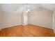 Bedroom with hardwood floors, ceiling fan, and neutral paint at 2140 Old Orchard Lane Ln, Canton, GA 30114