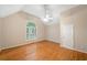 Bedroom featuring hardwood floors and a ceiling fan at 2140 Old Orchard Lane Ln, Canton, GA 30114