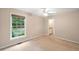 Cozy bedroom with a large window offering plenty of natural light at 2140 Old Orchard Lane Ln, Canton, GA 30114