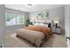 Bedroom with grey walls, neutral carpet, bed with an orange throw blanket and framed art at 32 Pullman Trl, Acworth, GA 30101
