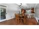 Bright dining room with hardwood floors and adjacent kitchen at 32 Pullman Trl, Acworth, GA 30101