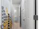 Hallway between the bedroom and bathroom with beige, patterned shower curtain at 32 Pullman Trl, Acworth, GA 30101