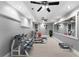 A well-equipped home gym with treadmill, weights, mirrored wall, and recessed lighting at 32 Pullman Trl, Acworth, GA 30101