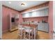 Charming kitchen features modern appliances, island, and plenty of counter space at 32 Pullman Trl, Acworth, GA 30101