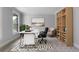 Bright office space with a large window, desk, bookshelf, and neutral decor at 32 Pullman Trl, Acworth, GA 30101