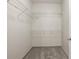 A walk-in closet featuring ample shelving for maximum storage at 390 17Th Nw St # 2005, Atlanta, GA 30363