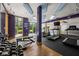 Community gym with treadmills, free weights, and glass doors providing natural light at 390 17Th Nw St # 2005, Atlanta, GA 30363