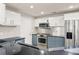 Stylish kitchen featuring modern appliances, sleek cabinetry, and gorgeous granite countertops at 390 17Th Nw St # 2005, Atlanta, GA 30363