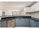 Stylish kitchen featuring modern appliances, sleek cabinetry, and gorgeous granite countertops at 390 17Th Nw St # 2005, Atlanta, GA 30363