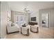 Inviting living room featuring access to a balcony, wooden floors and an open floor plan leading to the bedroom at 390 17Th Nw St # 2005, Atlanta, GA 30363
