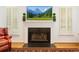 Close up of fireplace with white mantle and a decorative display at 1117 Haven Glen Ne Ln, Brookhaven, GA 30319
