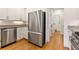 Modern kitchen with stainless steel appliances and white cabinets at 1117 Haven Glen Ne Ln, Brookhaven, GA 30319