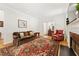 Comfortable living room with hardwood floors, decorative rug, and traditional decor at 1117 Haven Glen Ne Ln, Brookhaven, GA 30319