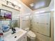 Bright bathroom features modern vanity, stylish fixtures, and a tiled shower with a glass door at 2355 Quail Creek Ter, Buford, GA 30519