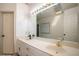Bright bathroom featuring double sinks, vanity, and a large mirror at 2355 Quail Creek Ter, Buford, GA 30519