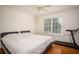 Bedroom with hardwood floors and natural light at 2355 Quail Creek Ter, Buford, GA 30519