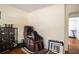 Bonus room featuring a massage chair and hardwood floors at 2355 Quail Creek Ter, Buford, GA 30519