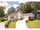 This house has a long driveway and is flanked by a lush, green lawn at 2355 Quail Creek Ter, Buford, GA 30519