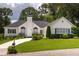 Charming single-story home with a well-manicured lawn and lovely landscaping at 2355 Quail Creek Ter, Buford, GA 30519