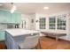 Bright kitchen with stainless appliances, a center island, and a breakfast nook with backyard views at 2355 Quail Creek Ter, Buford, GA 30519