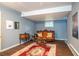 Cozy living room with hardwood floors, area rug, and ornate furnishings at 2355 Quail Creek Ter, Buford, GA 30519