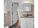 Classic bathroom features a vanity with sink and ample storage, offering functionality at 2585 Regency E Dr, Tucker, GA 30084