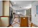 Well-appointed kitchen with granite countertops, stainless steel appliances, and custom cabinetry at 2585 Regency E Dr, Tucker, GA 30084