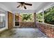 Cozy screened porch with brick surround, offering a serene space to enjoy the outdoors at 2585 Regency E Dr, Tucker, GA 30084